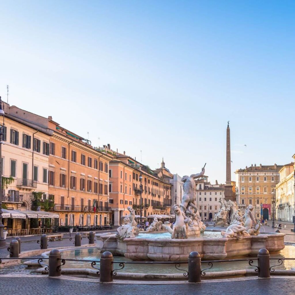 The Piazza Navona in Rome Italy. You can see one of the secondary fountains, with the piazza extending behind the fountain.