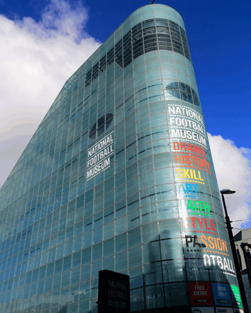Modern glass building of the National Football Museum in central Manchester