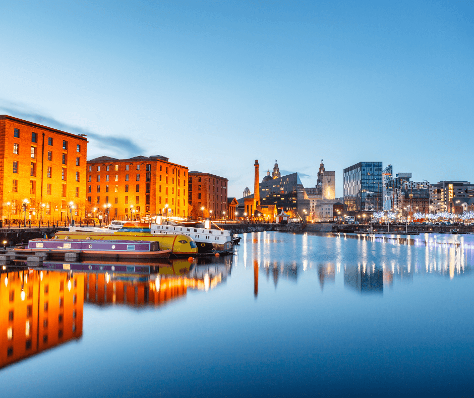 Royal Albert Dock with historic red-brick warehouses and reflections in the water