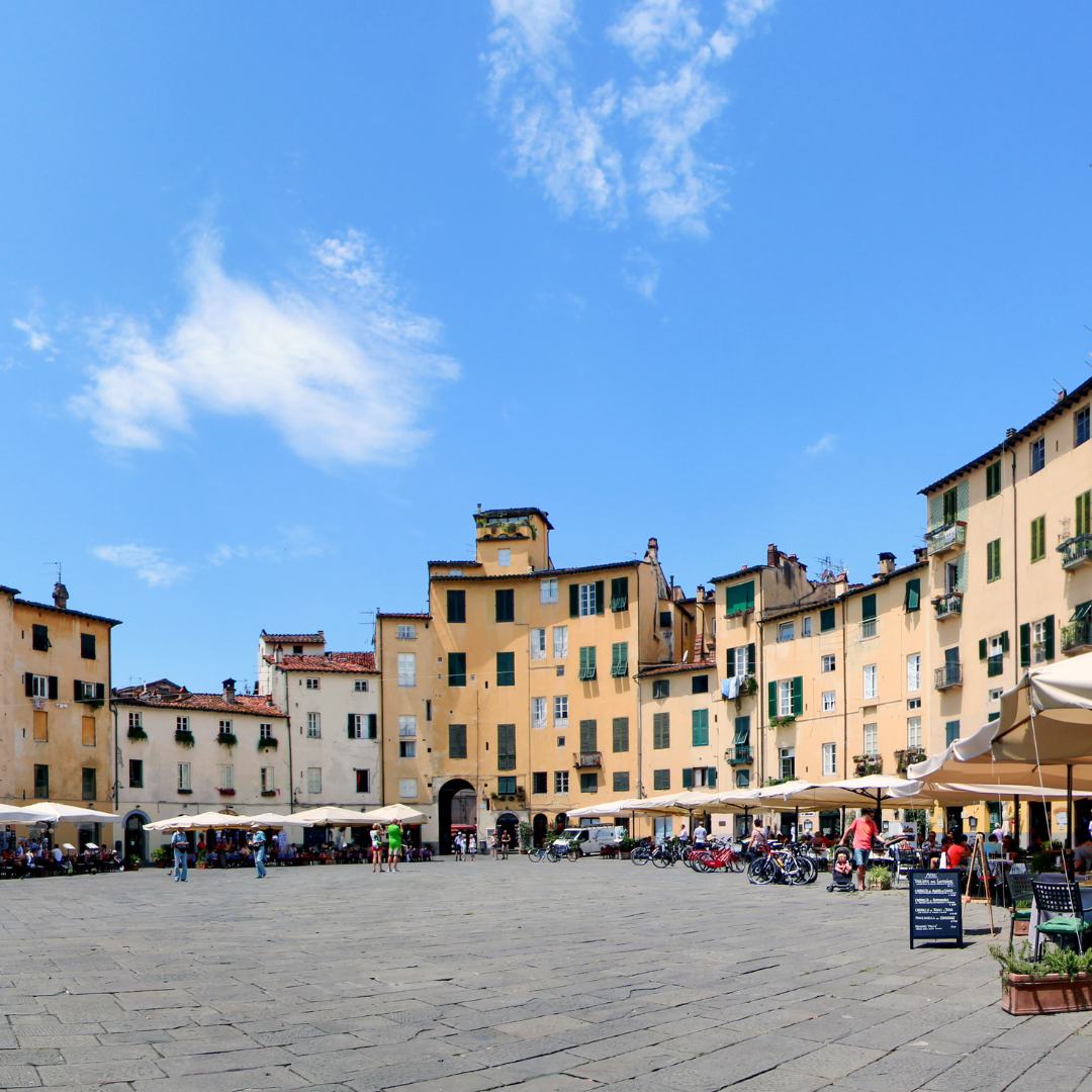 The rounded facades of buildings surrounding the Piazza dellanfiteatro in Lucca, Tuscany, Italy