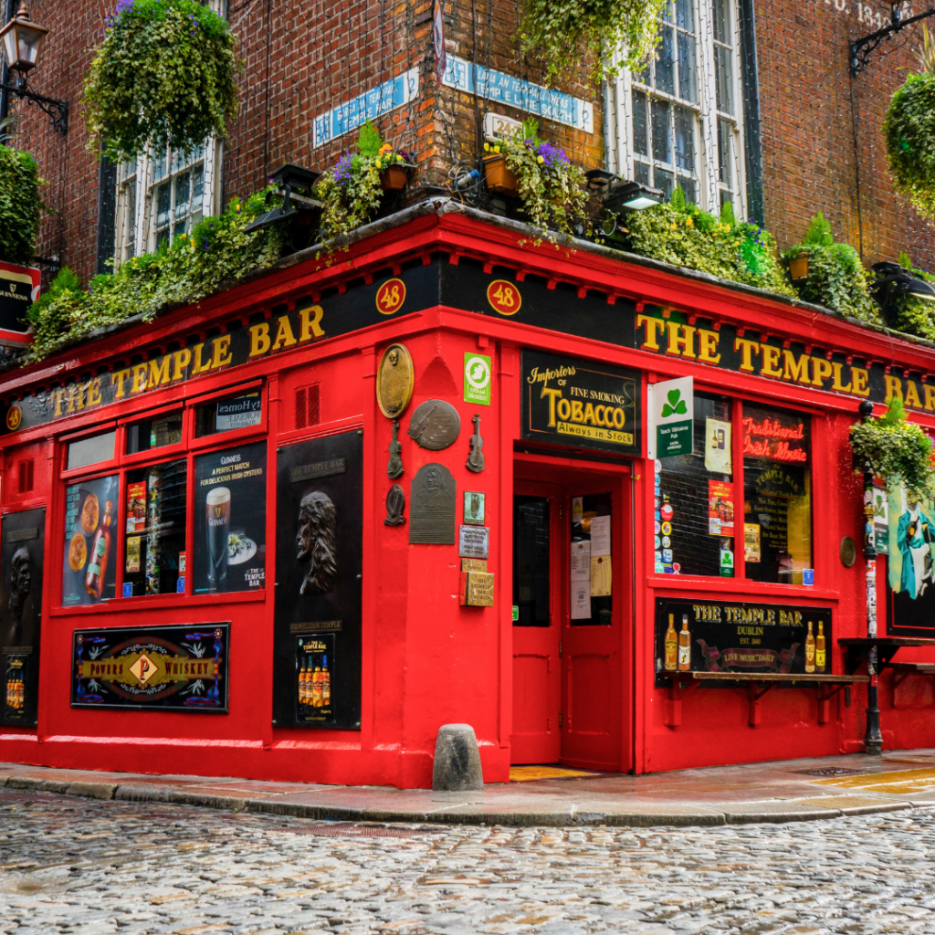 Historic Temple Bar with its distinct red facade in Dublin, Ireland