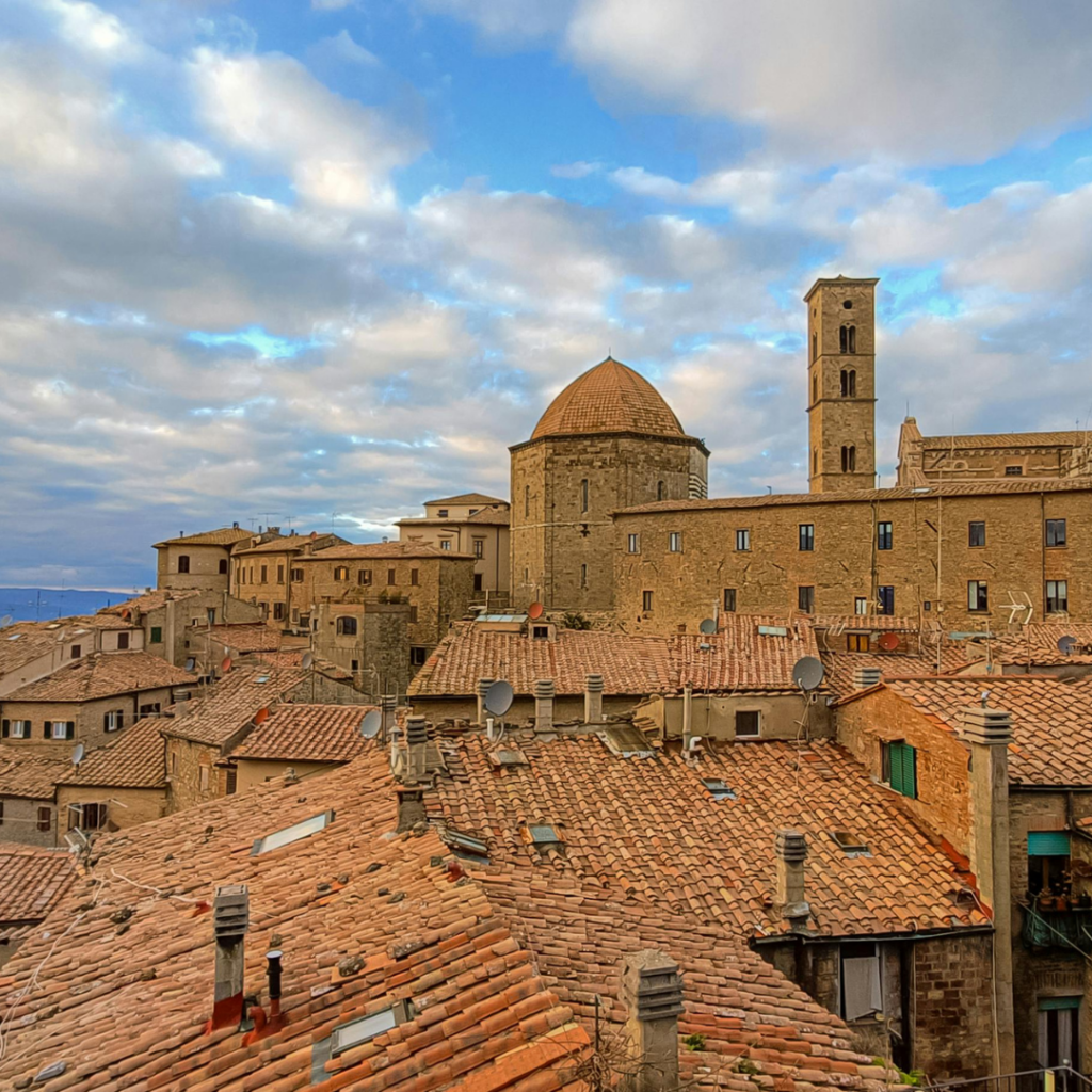 The terra cotta roofs and stone buildings of Volterra, Tuscany, Italy