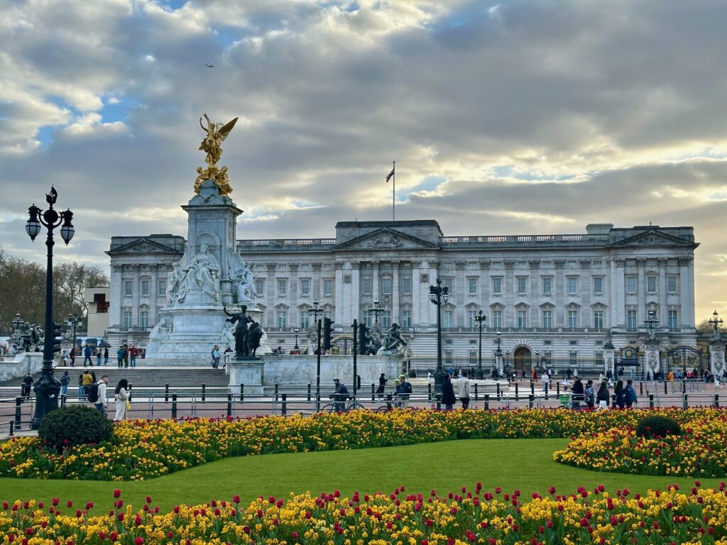 The facade of Buckingham Palace with the Victoria Monument in London
