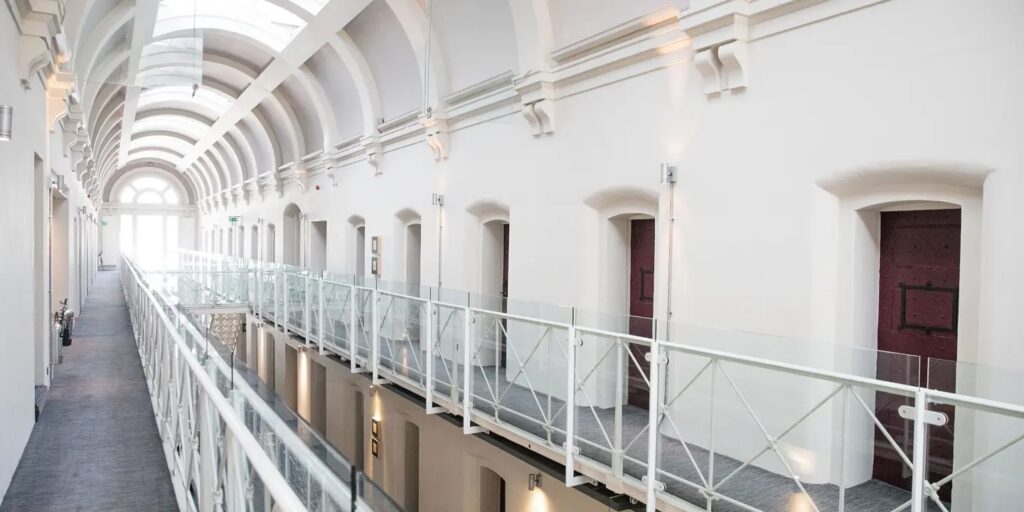 A hallway at Malmaison Oxford, where former prison cells have been turned into guest rooms