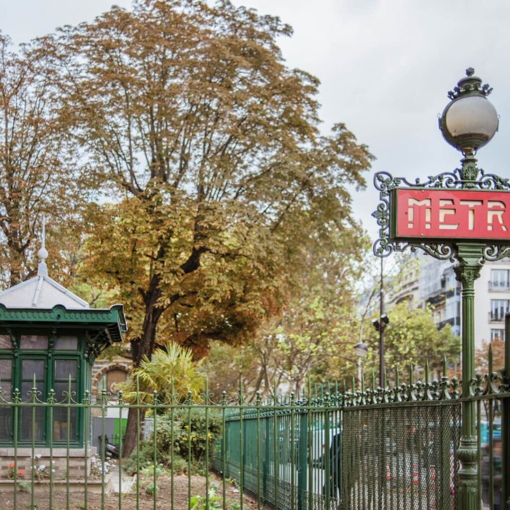 Metro Station sign in front of tree in Saint Germain, the 6th Paris Arrondissement