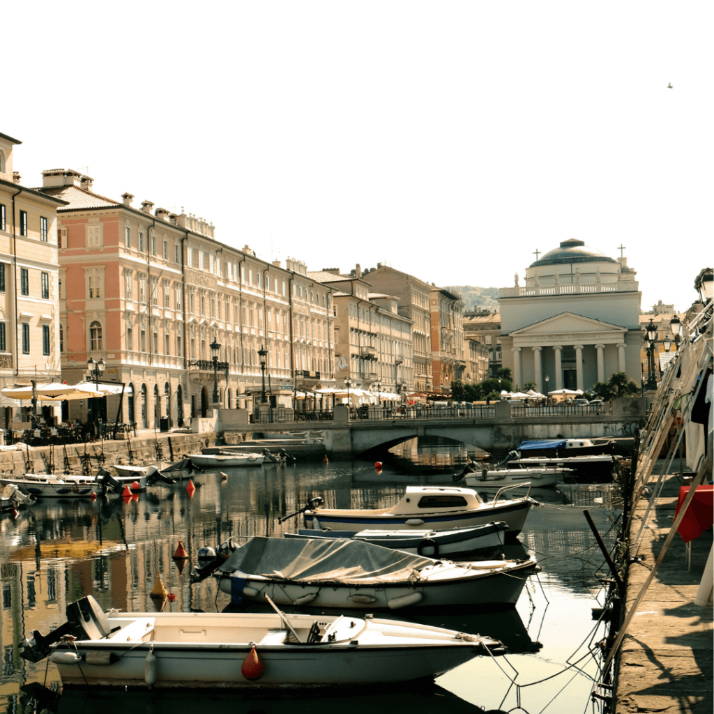 Boats moored on a river in Trieste, in the Friuli Venezia Giulia region of Italy