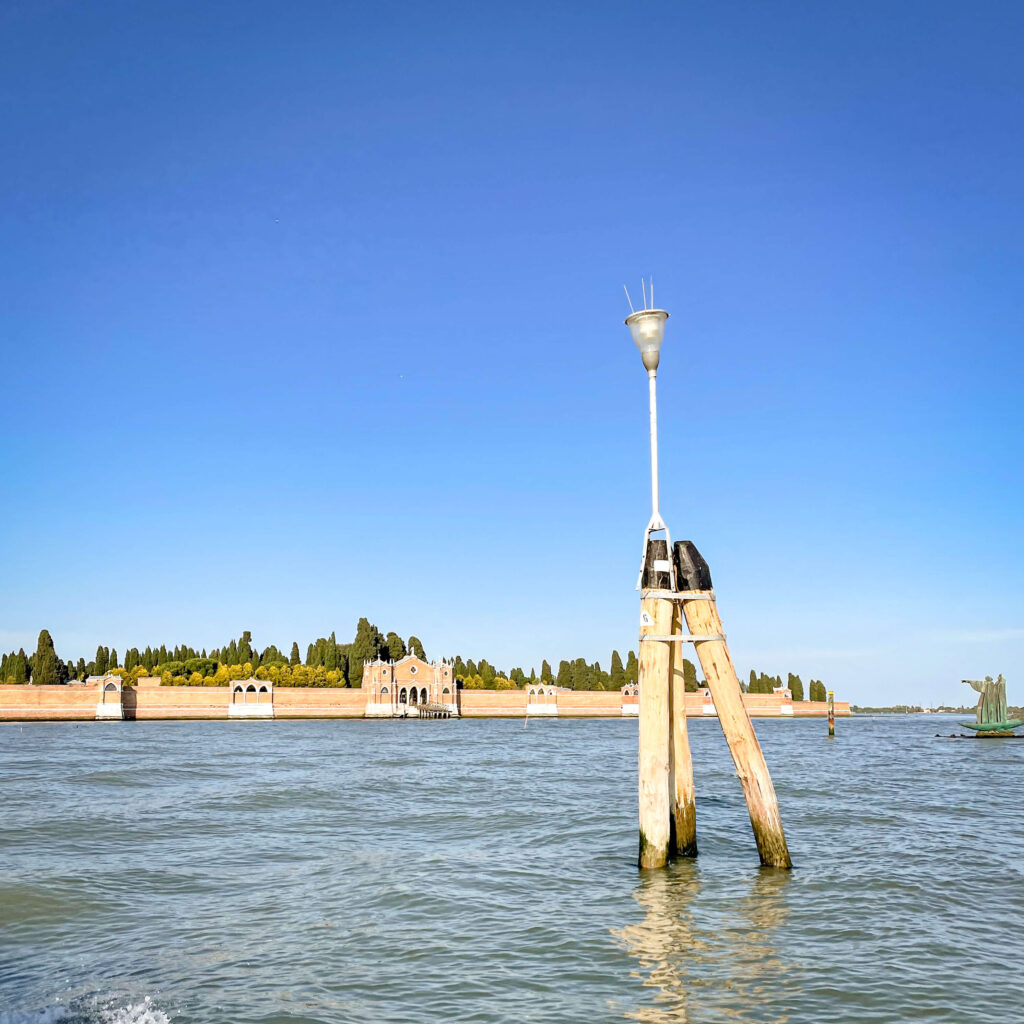 View of San Michele island from the water, the cemetery for the entire group of islands, one of the lesser known Venice Italy facts